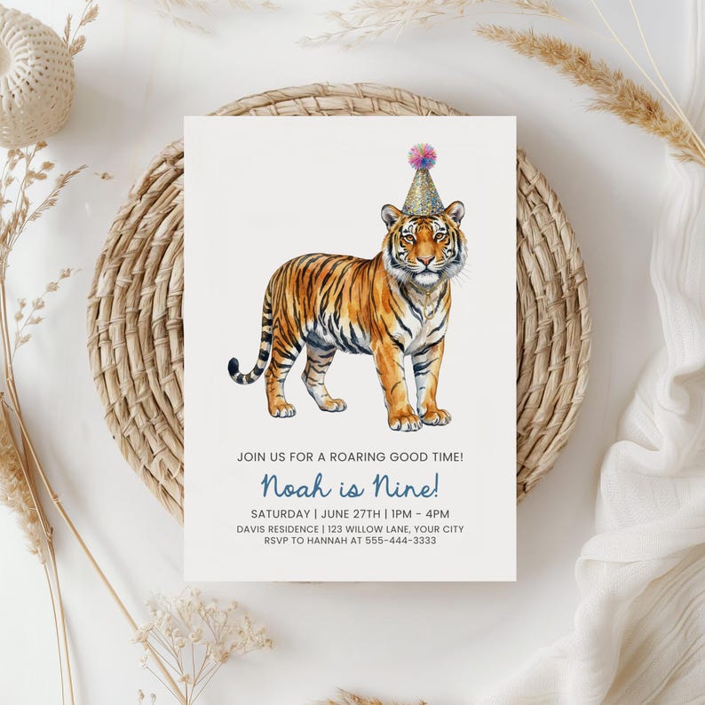 May include: A birthday invitation featuring a watercolor illustration of a tiger wearing a party hat. The invitation includes the text "Join us for a roaring good time!" and details for a party, including the name "Noah is Nine!"