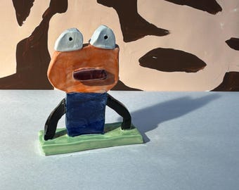 ペギー・クロール・ロバーツ作「ネーブルオレンジヘッド」陶器製置物（4インチ×4インチ×2インチ）