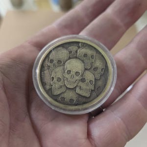 Pile of Skulls Coin