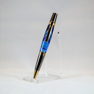 One of a Kind Classic Twist Pen in Gold Titanium and Black Titanium with Handcrafted Acrylic Body.