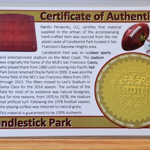 May include: Certificate of Authenticity for Candlestick Park memorabilia. The document features a red seat section graphic, a football, and a baseball. The text details the stadium's history and authenticity.