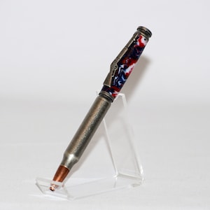 Bullet Cartridge Twist Pen in Red, White, and Blue Acrylic  in Antique Silver Finish with Velvet Gift Bag