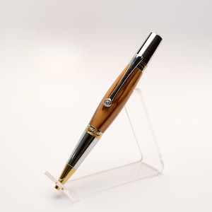 Bethlehem Olive Wood Majestic Squire Twist Pen in Gold Titanium and Chrome Finish with Swarovski Crystal.