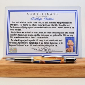 Handcrafted Pen Featuring a Marilyn Monroe US Stamp and a Small Swatch of One of Marilyn Monroe&#39;s White Gloves Cast In Acrylic
