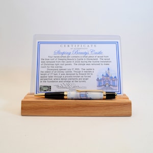 Handcrafted Pen Featuring a Small Piece of Wood From Sleeping Beauty's Castle Roof cast in acrylic