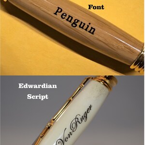 May include: Two pens are shown. One is light brown with gold accents and the word "Penguin" in black. The other is white with gold accents and the name "Von Ruger" in black script. The background is yellow and gray.
