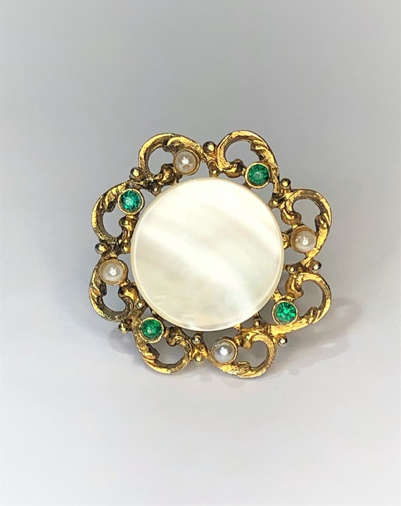 Old abalone brooch and mother pearl