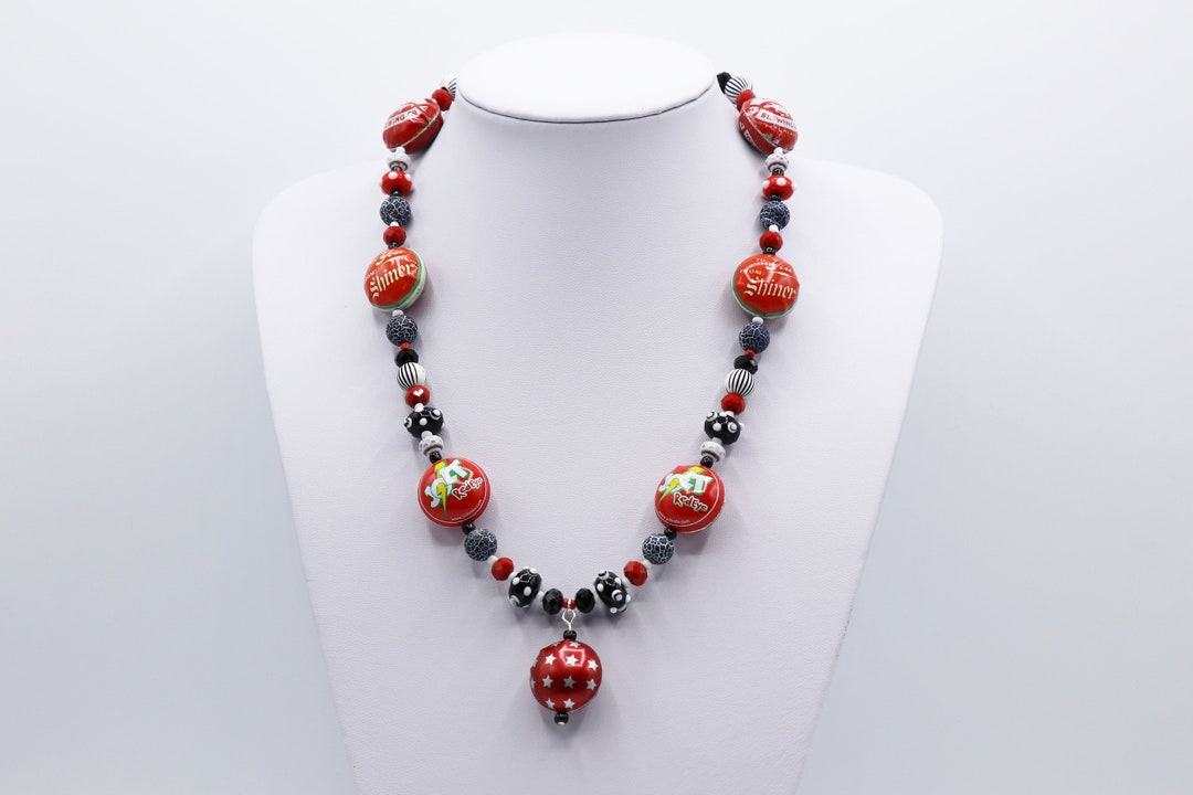 Red, Black and White Bottle Top Necklace. Seven Striking Retro American