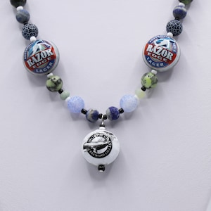 Bottle cap necklace with whales and sharks. Blue, green and black gemstones, lapis lazuli, chrysoprase and agate.  Whale necklace
