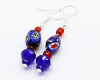 Delicate earrings using vintage blue millefiori venetian glass beads, and sparkly glass.