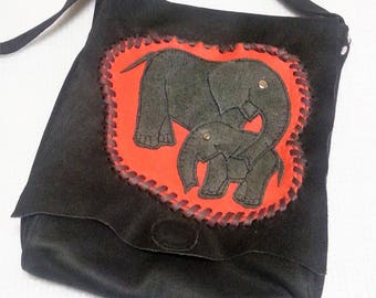Dark brown, simple, smaller leather shoulder bag, with elephants