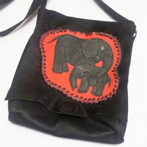 Dark brown, simple, smaller leather shoulder bag, with elephants image 1