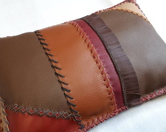 Filled leather cushion in country house style