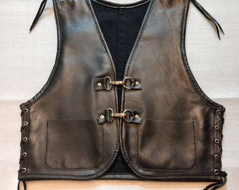 Black leather vest with laces, size. XS, unisex, real leather