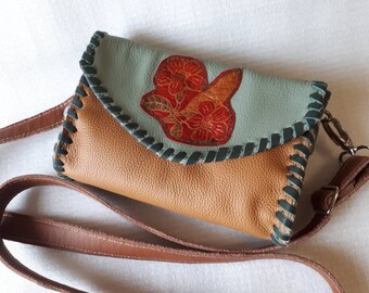 small multi-colored leather bag to hang around your shoulder