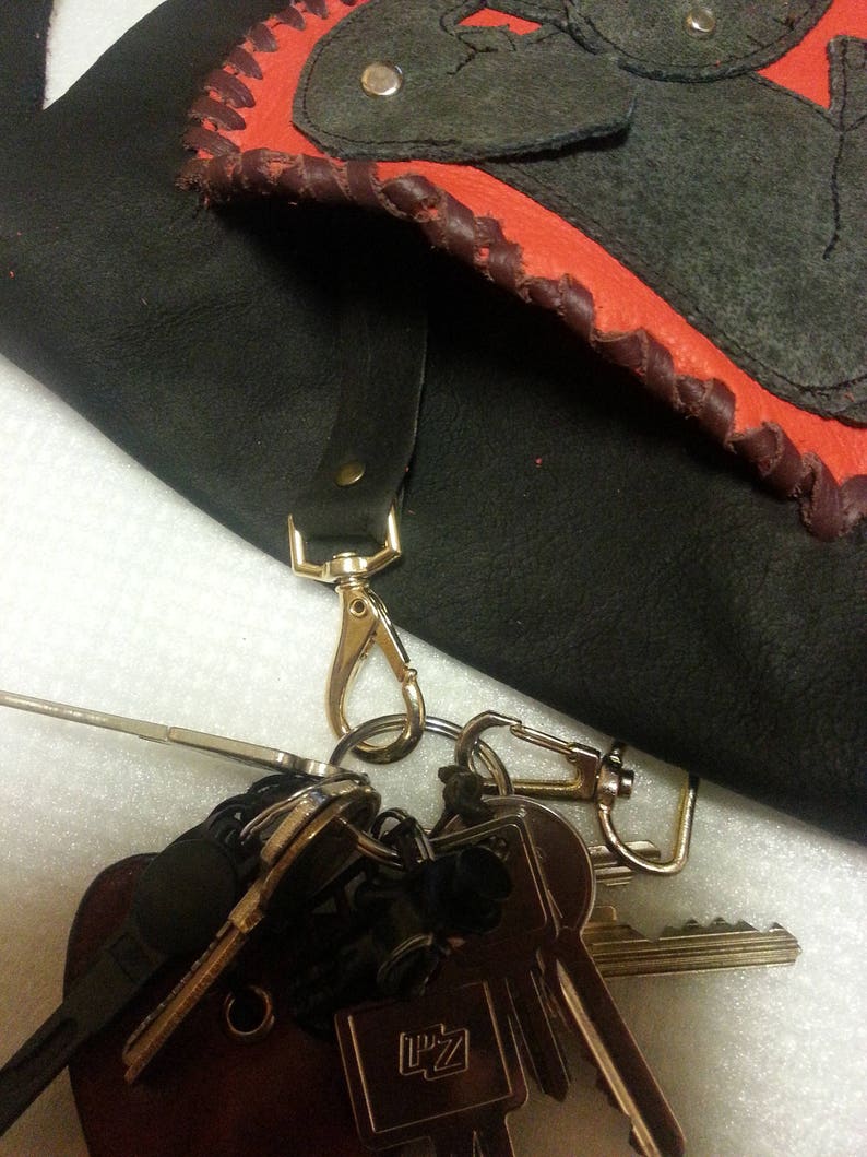 Dark brown, simple, smaller leather shoulder bag, with elephants image 3
