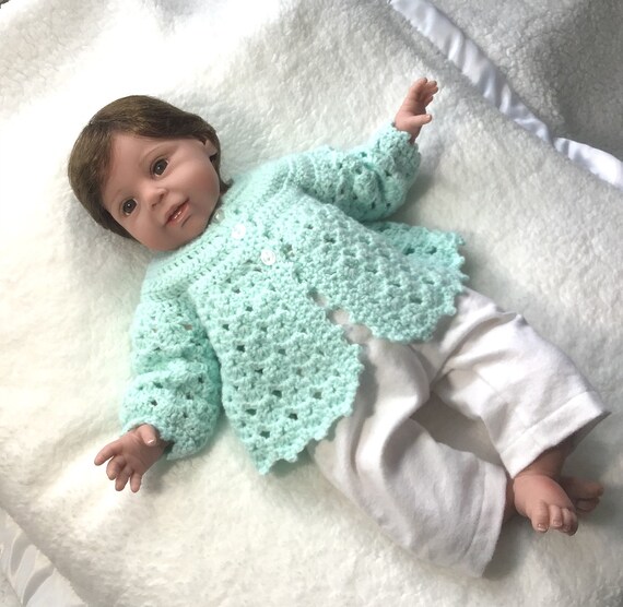 green baby coat