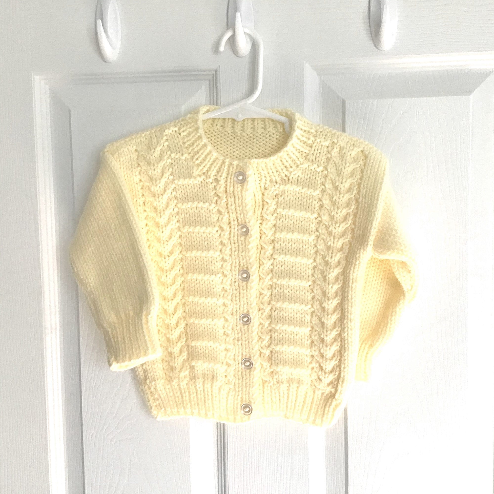 light yellow sweater