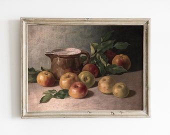 May include: A framed painting of a still life with a brown ceramic pitcher and a group of red and green apples on a white tablecloth.