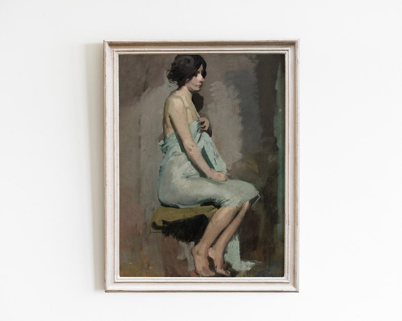 May include: A painting of a woman sitting on a stool, wearing a light blue robe. The woman has dark hair and is looking to the side. The painting is done in a realistic style and has a muted color palette.