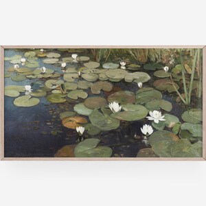 May include: A painting of a pond with white water lilies and green lily pads. The water is a dark blue and the lily pads are a variety of shades of green.