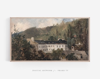 Op de afbeelding: Een ingelijste digitale kunstafdruk van een landschapsschilderij. Het kunstwerk toont een groot wit gebouw met een donker dak, gelegen tussen groene bomen en een bergketen. De tekst "DIGITAL ARTWORK for FRAME TV" staat onderaan.