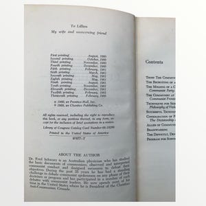 May include: Open book pages with text. The left page reads "To Lillian, My wife and unswerving friend" and lists printing dates. The right page shows a table of contents. The book is printed in the United States of America.