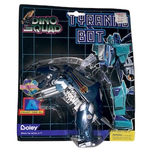 May include: A Dino Squad Tyrannobot action figure in its original packaging. The toy is a blue and silver robot with a teal accent. The packaging features the text "Tyrannobot" and "Collect Them All."