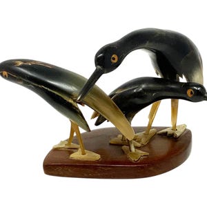 Vintage Penguins Hand Carved out of Horn statue figure RARE
