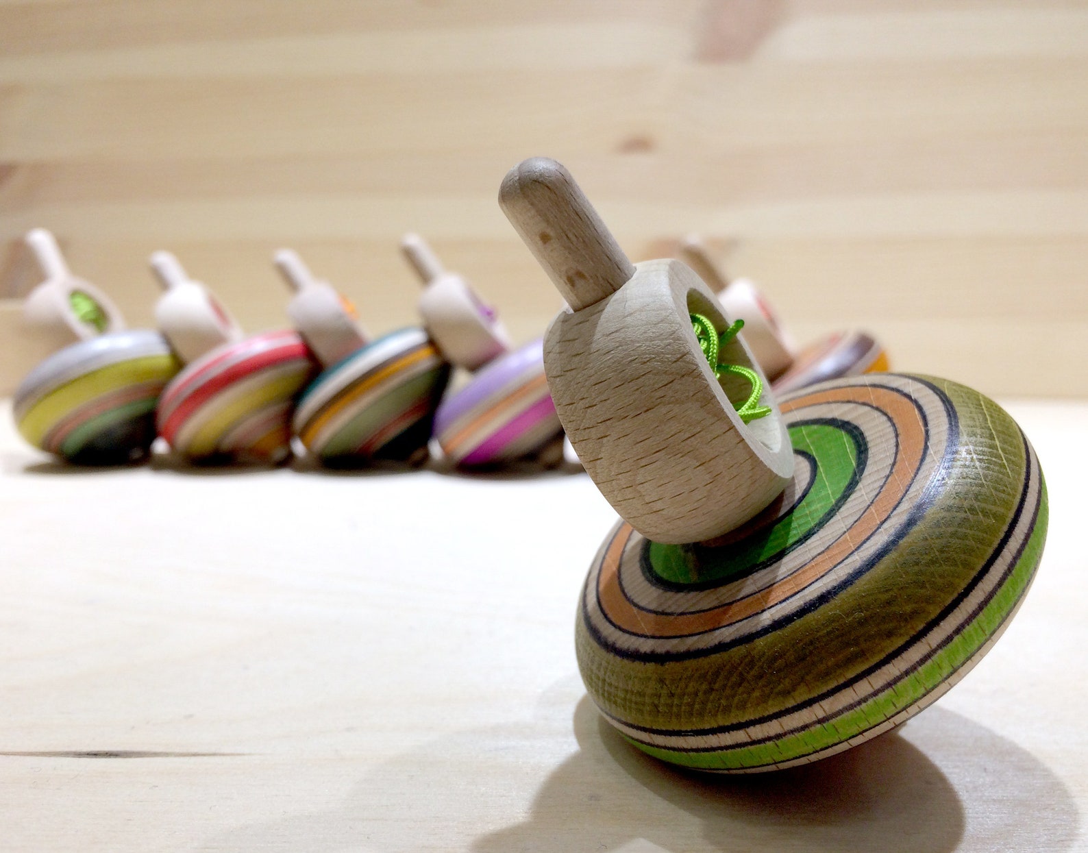 Wooden top. Spinning Top.