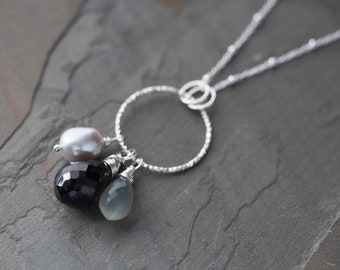 Gemstone and sparkly silver circle necklace with gray moonstone, black spinel & freshwater pearl