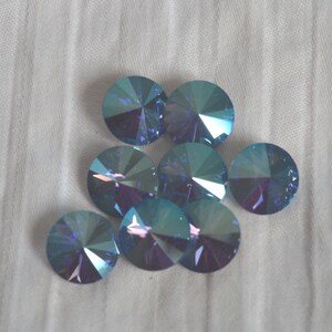 24 pieces 1122 Tanzanite SHIMMER 10mm (47ss) Crystal Rivolis