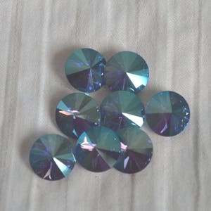 12 pieces 1122 Tanzanite SHIMMER 10mm (47ss) Crystal Rivolis