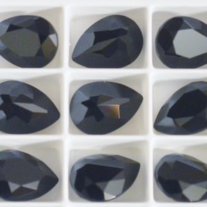 4 pieces 4320 Jet 14mm x 10mm Crystal Fancy Pear