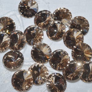 6 pieces 1122 Light Silk 10mm (47ss) Crystal Rivolis