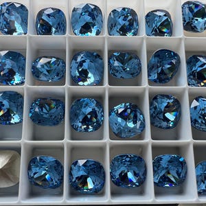 4 pieces 4470 Recreated Ice Blue 12mm Crystal Square Cushion Cut