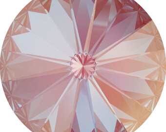 May include: A round, iridescent pink crystal with a faceted design. The crystal has a light pink hue with a subtle shimmer.