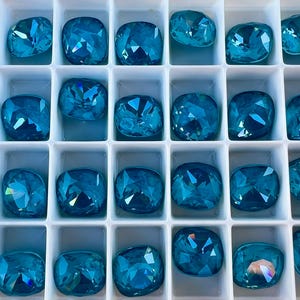 4 pieces 4470 Teal Ignite 12mm Crystal Square Cushion Cut