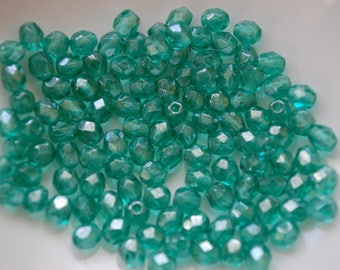 1 lot 10 perles  facettes 6mm vert émeraude