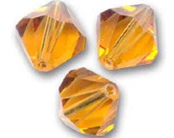 1 lot 10 Toupies 6mm topaz perle cristal Swarovski