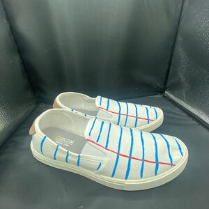 Patrón de cuaderno Nuevas zapatillas planas blancas pintadas a mano