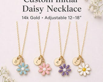 May include: Four gold necklaces with daisy pendants in blue, pink, purple, and white, each with a gold initial charm. The necklaces are adjustable from 12 to 18 inches and are 14k gold. The text reads "Custom Initial Daisy Necklace".