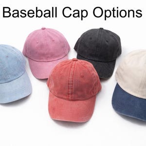 May include: Five baseball caps in various colors: light blue, pink, black, red, and cream with a navy blue brim. The text "Baseball Cap Options" is at the top. These caps are a classic accessory.