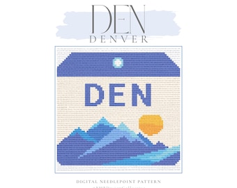 May include: A digital needlepoint pattern featuring a cross-stitch design of the word "DEN" in blue, with a mountain range and a yellow sun. The word "DENVER" is above the design in a stylized font.
