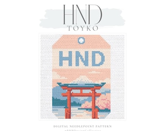 May include: A digital needlepoint pattern featuring a tag-shaped design with the text HND TOYKO at the top. The central graphic depicts a red torii gate, a mountain, and water in shades of blue, peach, and pink. The text HND is centered on the tag.