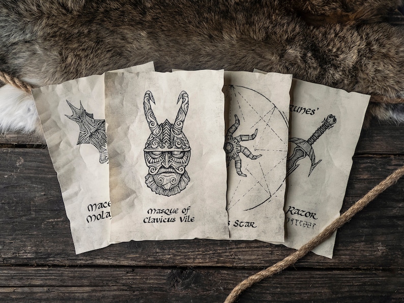 May include: Four parchment scrolls with black ink drawings of a mace, a mask, a star, and a razor. The scrolls have text on them, including "Mace Mola", "Masque of Clavicus Vile", "Star", and "Razor of Mehrunes".