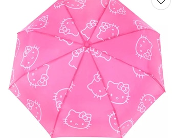 Nieuwe Hello Kitty paraplu in felroze met prijskaartje