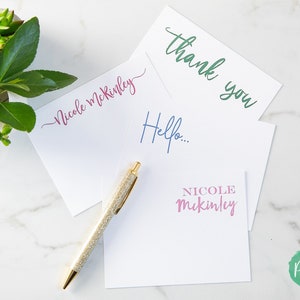 personalized stationery on granite background with plants
