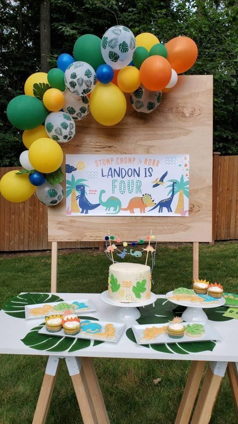 personalized boys birthday banner with dinosaur theme
