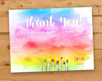 May include: A colorful birthday thank you card with a watercolor background in shades of blue, pink, yellow, and green. The card features the words "Thank you!" and "for making my birthday a masterpiece."